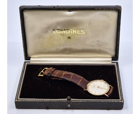A Longines 9ct. gold gentleman's wrist watch, manual wind, cal.19.4, having signed circular dial with applied gold baton indi