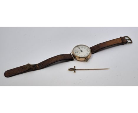 A 9ct. gold gentleman's wrist watch, c.1916, having white enamel Arabic numeral dial with Arabic numeral subsidiary seconds d