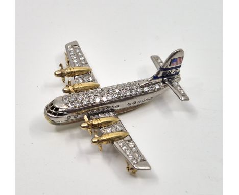 Aviation/Pan American Airways Interest: A white and yellow metal, enamel and diamond&nbsp;aeroplane brooch, realistically fas