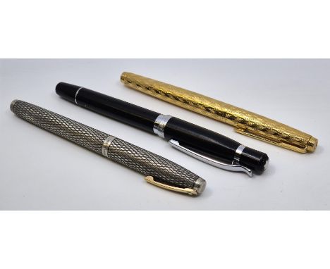 A Montblanc Rollerball pen, together with a sterling silver Sheaffer fountain pen, with 14ct. gold Sheaffer nib, and a Parker