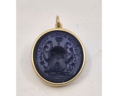 A dark blue glass intaglio seal, depicting an urn motif with three griffin heads within above a body with outer motto "Virtus