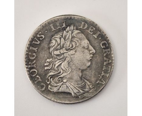 A George III 1763 "Northumberland" shilling, L3742, obv. Young laur and dr. bust r, rev. crowned cruciform shields. (EF)