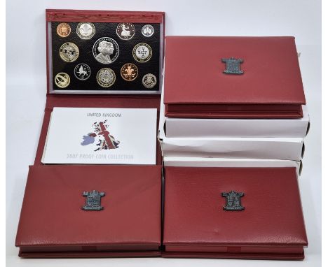 Seven Elizabeth II United Kingdom proof sets; 2001 proof Victoria &pound;5 struck in c/n, Bimetallic &pound;2, Bimetallic Mar