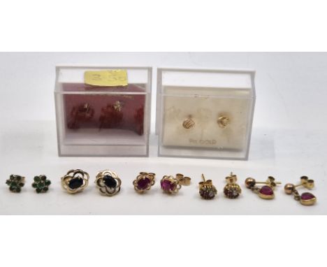 A pair of 9ct. gold, CZ and ruby cluster stud earrings (gross weight 1.0g), together with a pair of yellow metal and ruby stu