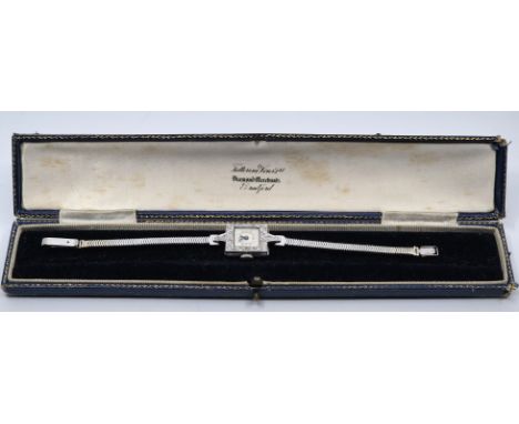 An Art Deco white gold and platinum cocktail watch, manual wind, having square Arabic numeral dial, 14mm wide white gold and 