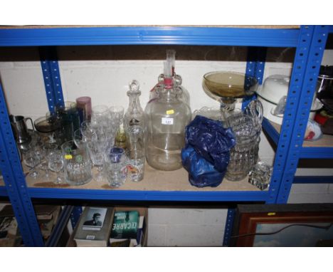 A quantity of glassware to include demi-johns, decanter and stopper, cake stand etc.