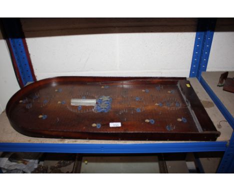 A bagatelle board 