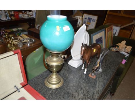 A brass oil lamp; a large Beswick horse AF; an Art Deco style boat figure and three carved horn ornaments 