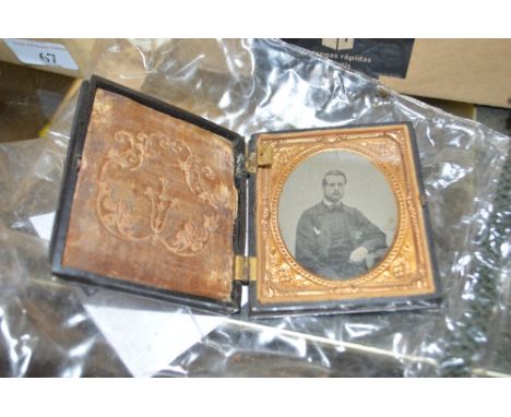An early Daguerreotype portrait in carved case