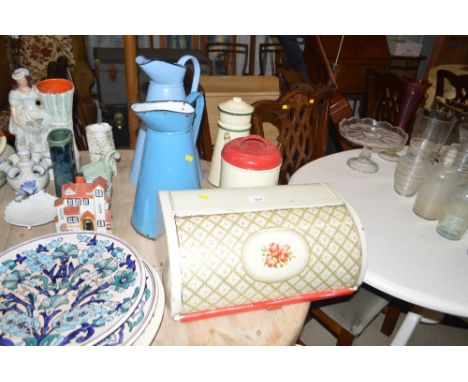 Two enamel jugs; a biscuit tin; an enamel coffee pot and a bread bin