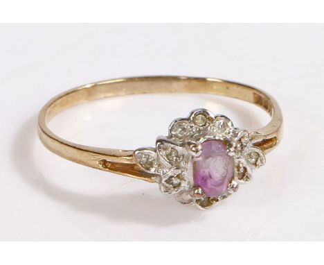 A 9ct gold amethyst and diamond cluster ring.Ring size W.Weighing 1.9 grams.