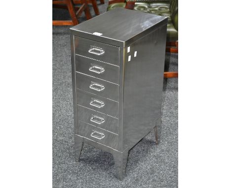 A vintage STOR polished filing cabinet