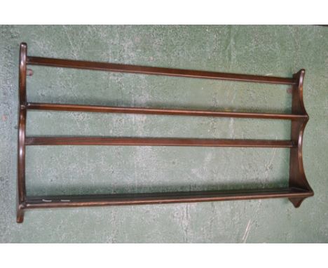 An Ercol plate rack and an Ercol chair (2)