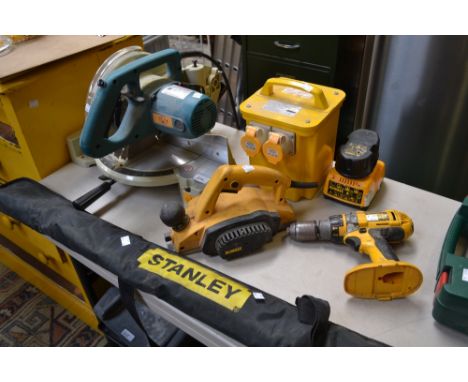 Tools - a 110V Makita chop saw; a 240v to 110v converter; a Dewalt power plane; a Dewalt cordless drill; a Stanley spirit lev