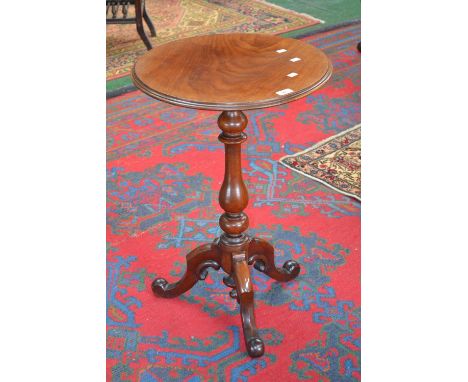 A Victorian mahogany tripod table, circular top, turned baluster fruitwood column, cabriole legs, knurled feet.