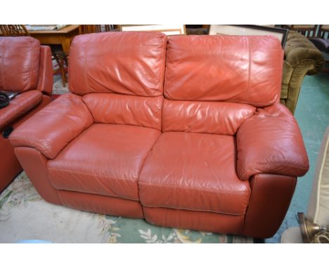 An electric reclining two seat sofa