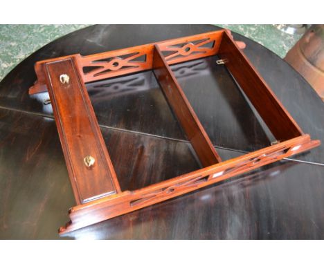 A modern mahogany wall hanging shelf, three tiers, single drawer