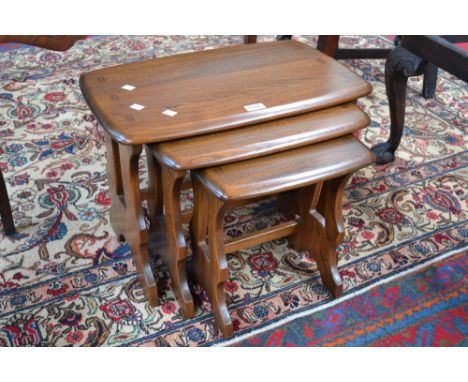 An Ercol nest of three tables