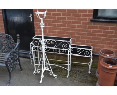 Two wrought iron planters; a wrought iron telescopic standard lamp (3)