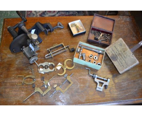 Horology - A K & D Co. main spring winder No.127; another; a Star balance wheel poising tool; another two, one with "run-out"