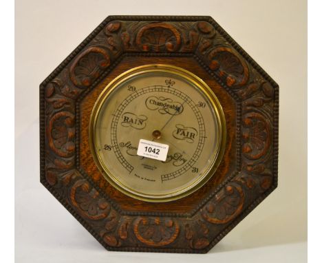 John Barker, Kensington, aneroid barometer in an octagonal carved oak case 
