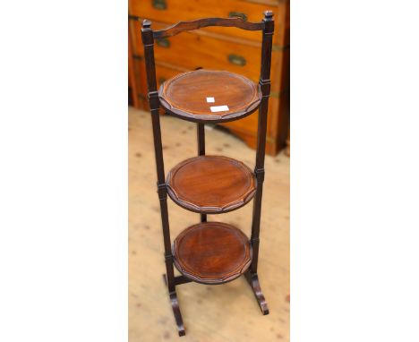 19th Century two shelf wall bracket with panelled doors, a three tier folding cakestand and an ebonised two tier jardiniere s