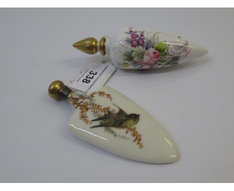 An unmarked porcelain perfume bottle with painted floral decoration by Stefan Nowacki, signed, 11cm high overall, together wi