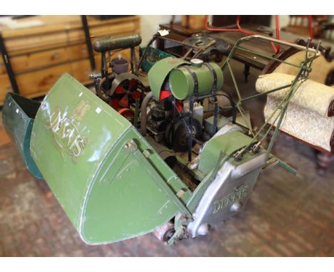 Large mid 20th Century petrol driven lawn mower by Dennis Brothers, with towable ride-on roller together with a similar lawn 