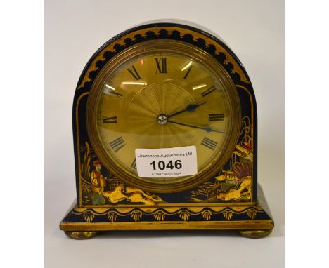 Small midnight blue chinoiserie decorated mantel clock, having circular gilt dial with Roman numerals on low brass bun feet, 