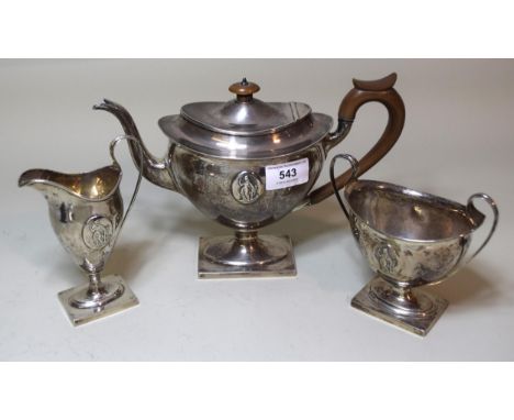 Early 20th Century Sheffield silver three piece tea service of oval pedestal design in George III style, 24oz t 