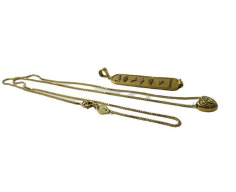 Egyptian yellow metal pendant, together with a modern 18ct gold box link chain with attached unmarked yellow metal heart shap