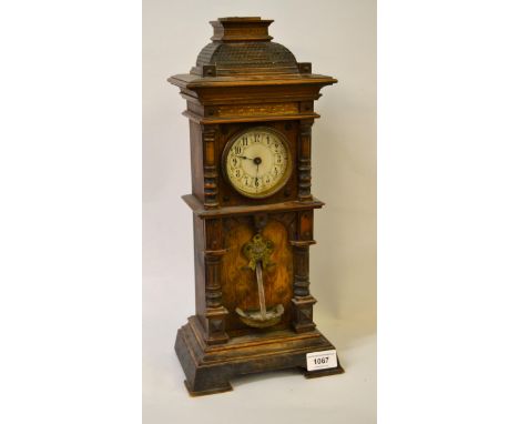 Late 19th / early 20th Century Continental walnut miniature longcase clock, the enamel dial with Arabic numerals above a simu