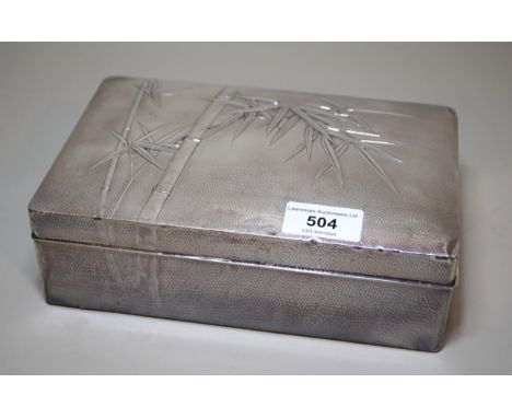 Japanese silver covered hardwood lined casket, the cover decorated with bamboo, signed K. Uyeda, stamped (some dents), gross 