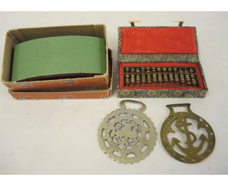 Mid 20th Century Chinese miniature brass abacus in a fabric covered case, together with a leather blotter and two horse brass