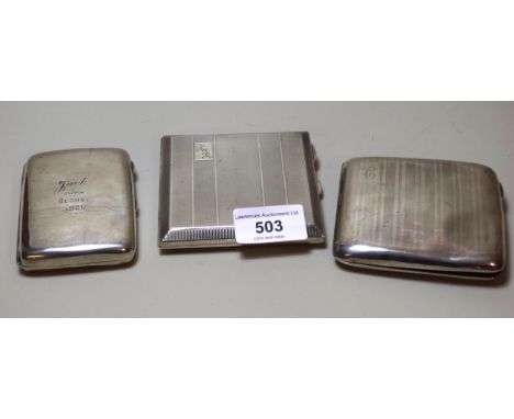 Two Birmingham silver engine turned decorated cigarette cases, 1932 and 1927 and another Chester silver cigarette case engrav