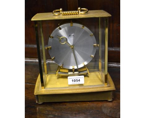 Kundo electric mantel clock, a Bradford exchange composite mantel clock and an oak two train mantel clock 