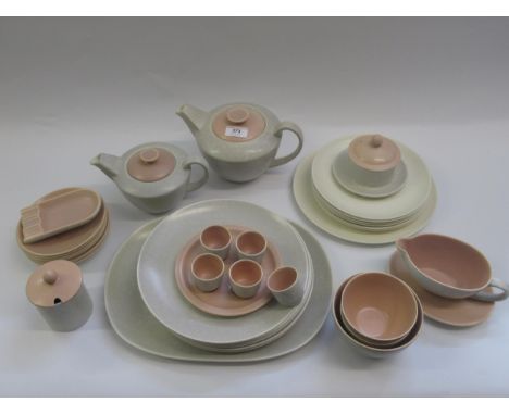 Forty plus pieces of Poole pottery twin tone tea and dinnerware including two teapots etc 