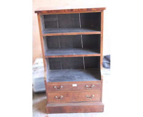 Small mahogany open bookcase having two shelves above two long drawers with brass swan neck handles on plinth base, 100cm hig