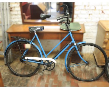 Vintage pedal cycle by Rudgwick, together with a mid 20th Century painted metal ride-on toy horse 