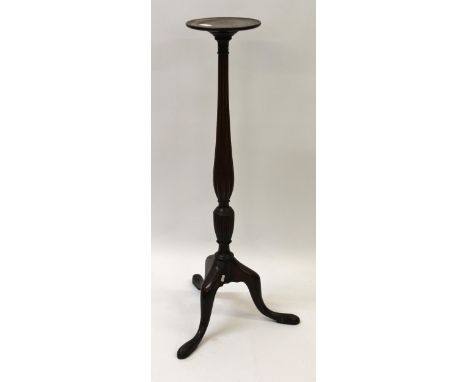 Edwardian mahogany torchere with a circular dish top above a fluted baluster column on tripod base 