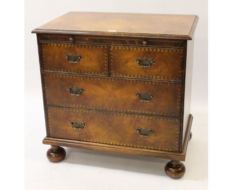 Good quality reproduction walnut and burr wood chest in early 18th Century style, the moulded top above a brushing slide, two