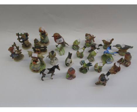 Collection of twenty three various Royal Worcester, Goebel and Beswick figures of birds etc, including a Denton figure (some 