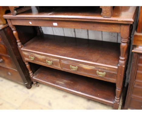 Edwardian oak buffet with two drawers and turned supports, 122cm wide 