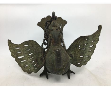 An Indian bronze lamp. H:20cm