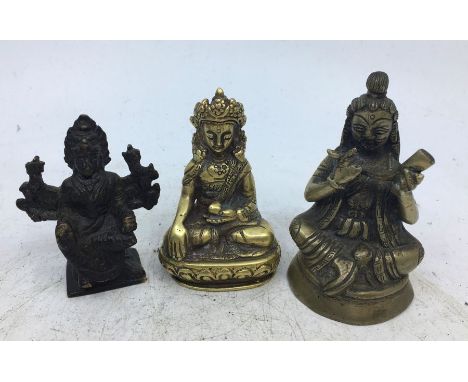 A collection of three bronze figures to include a small 20th century Sino-Tibetan bronze figure of a seated eight armed deity