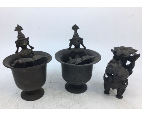 A pair of 20th century Indian bronze pedestal bowls with figural centres, height 12.5cm together with a small 20th century Ea