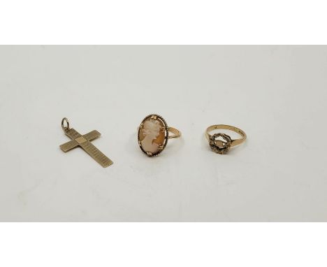 A 9ct. gold engine turned cross, together with 9ct. gold cameo ring, size UK O 1/2 and a 9ct. gold ring (this last as found).