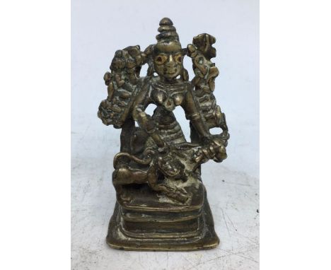 A small Indian bronze figure of a deity. H:7cm