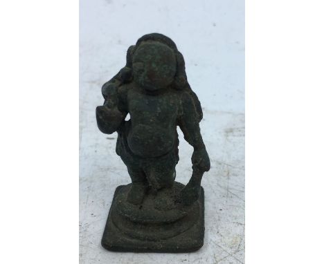 A small Indian bronze figure of a deity. H:3.9cm