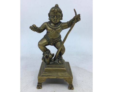 An Indian bronze figure of a deity. H:14.8cm